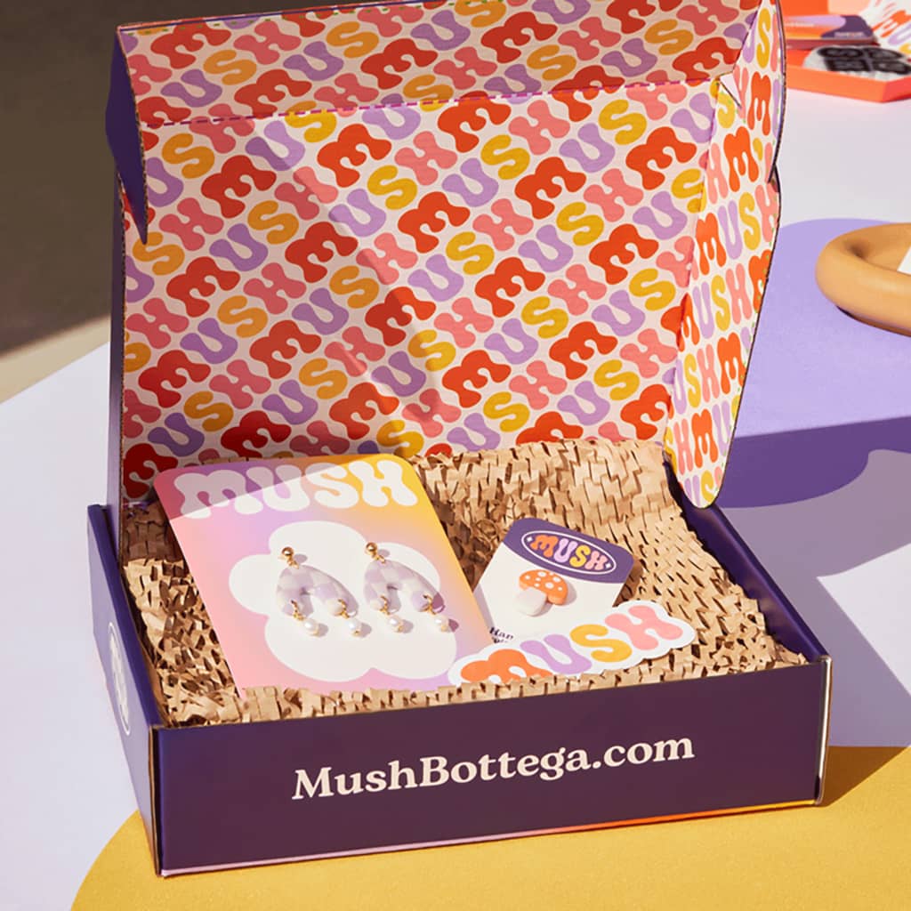 Inner packaging design with logo card and stickers with shredded cardboard