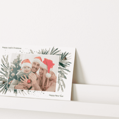 Personalized Christmas cards for the family lined up on display