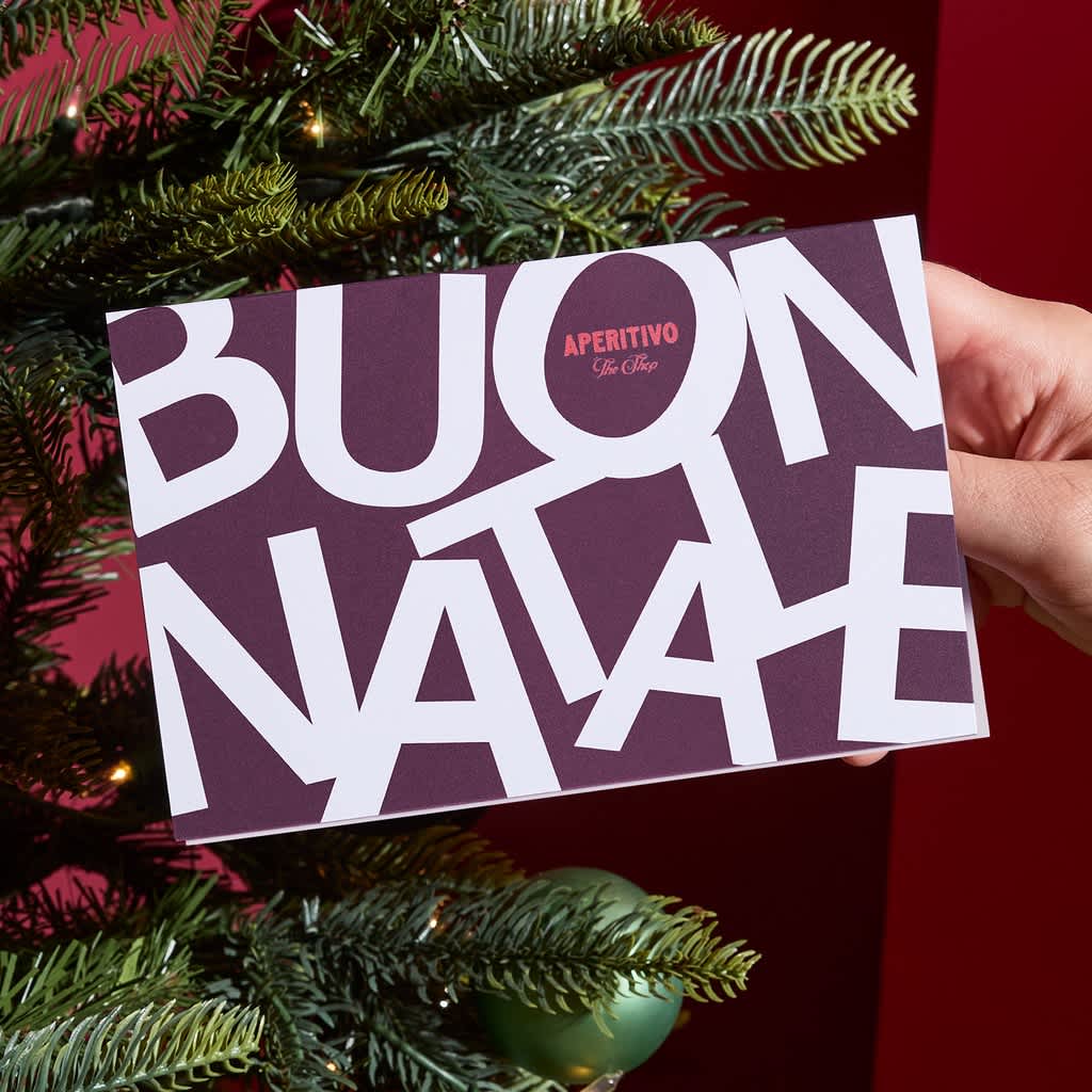Example of branded business Christmas card with the greeting “Buon Natale” in oversized typeface.