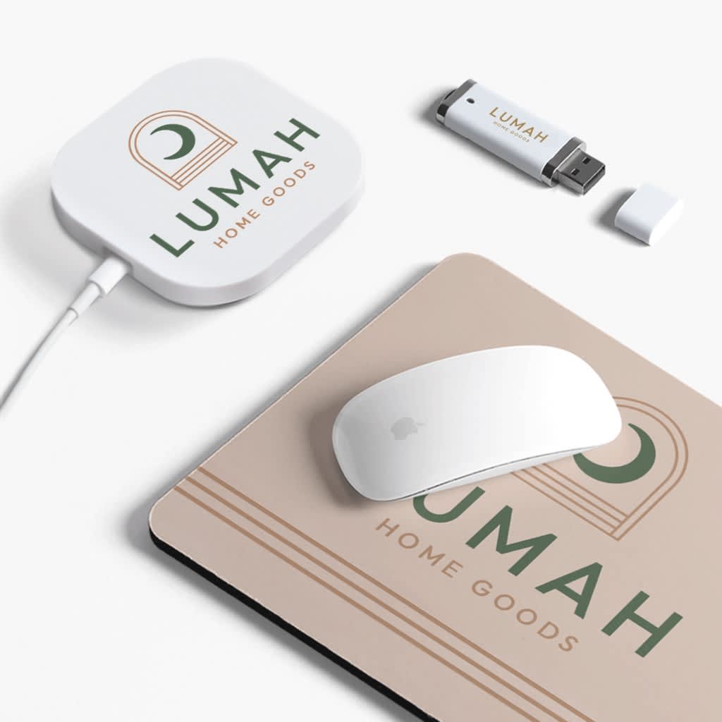 Selection of branded “Lumah” desk accessories, including a mouse pad, USB storage, and portable charger.