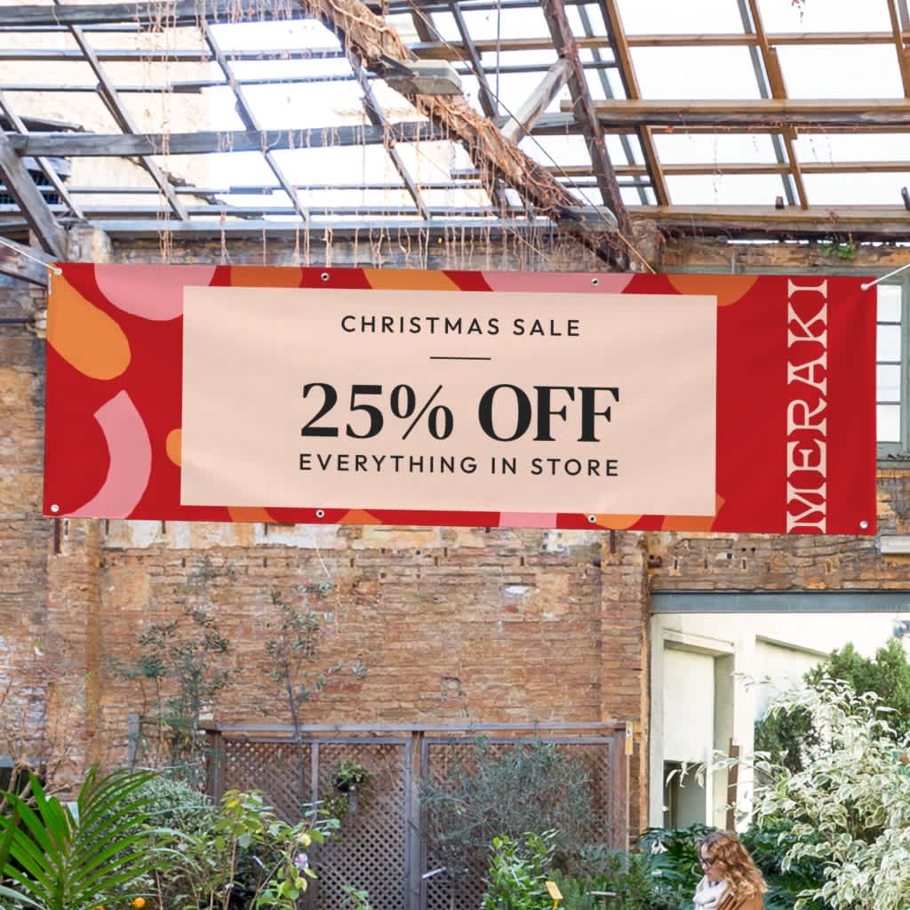 Holiday indoor banner promoting a Christmas sale with 25% off everything in store.